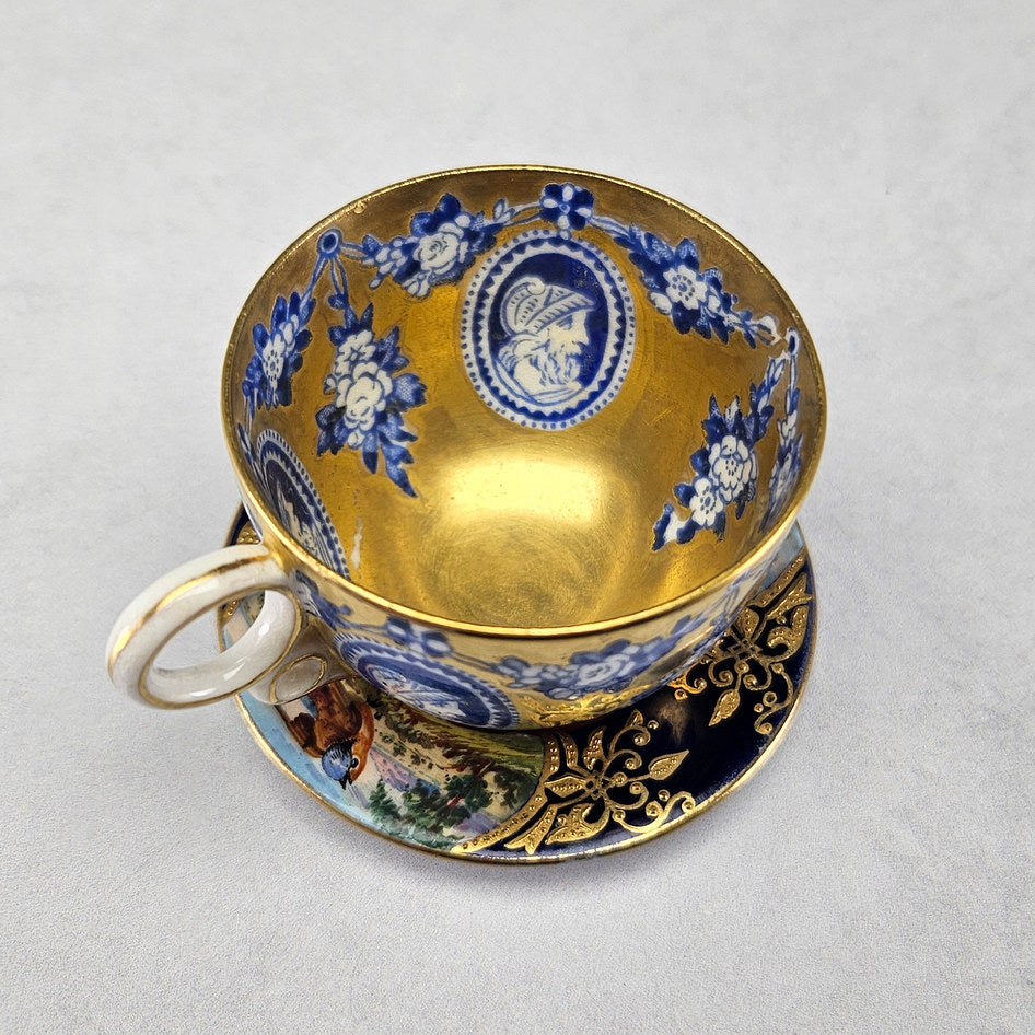 Coalport demitasse cup showing blue flowers and gold