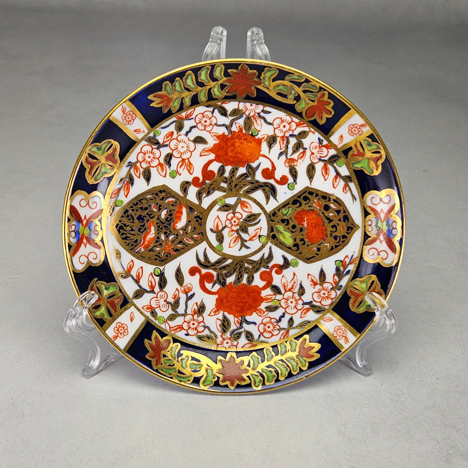 Derby Crown Imari side plate with cobalt and iron-red floral panels