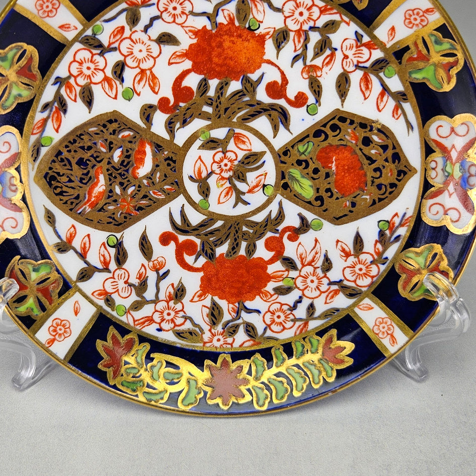 Derby Crown Imari side plate showing its shaped ceramic form