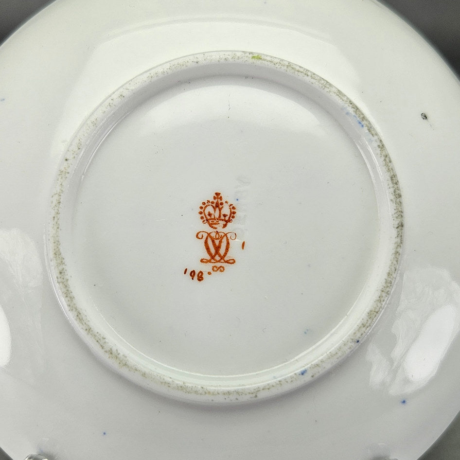 Underside of Derby Crown side plate with factory mark