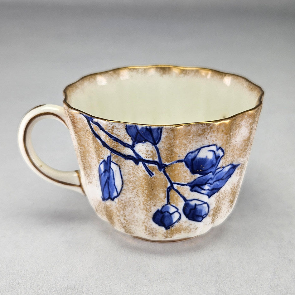 Royal Doulton C1800 teacup with visible decorative details