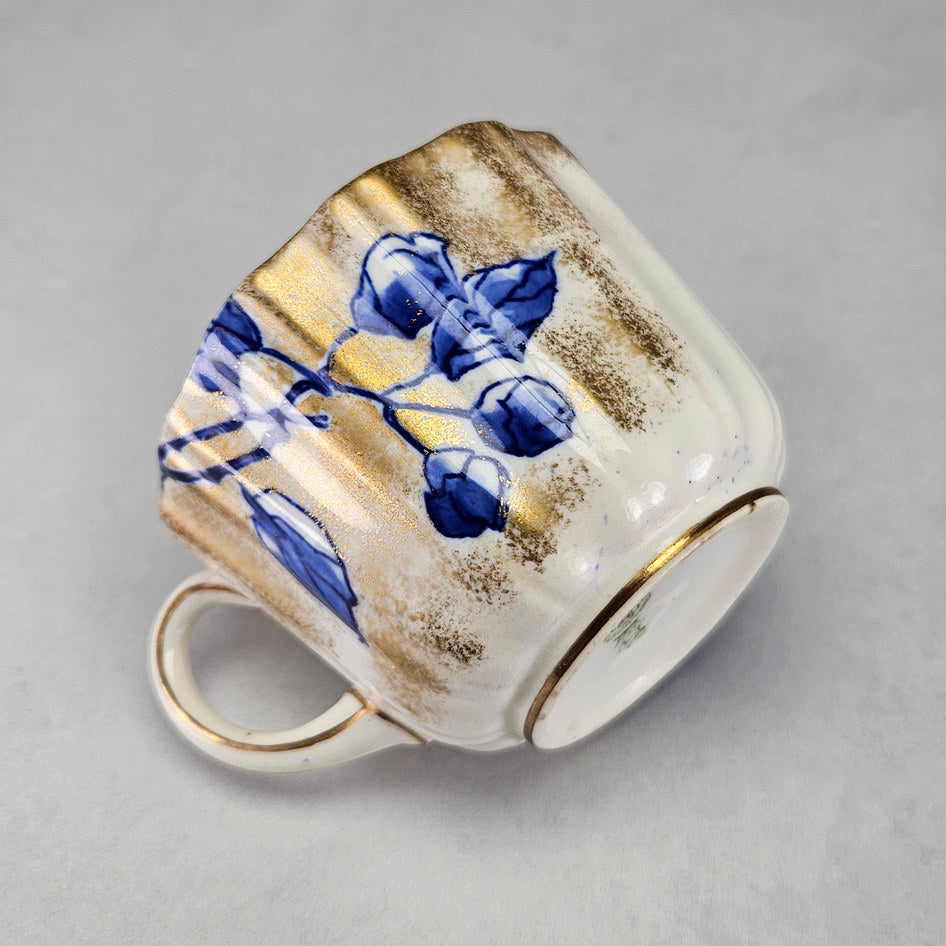 Royal Doulton C1800 teacup with close floral and border details