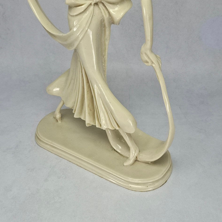 Art Deco-Style Cream Lady Figurine with Flowing Ribbon Detail