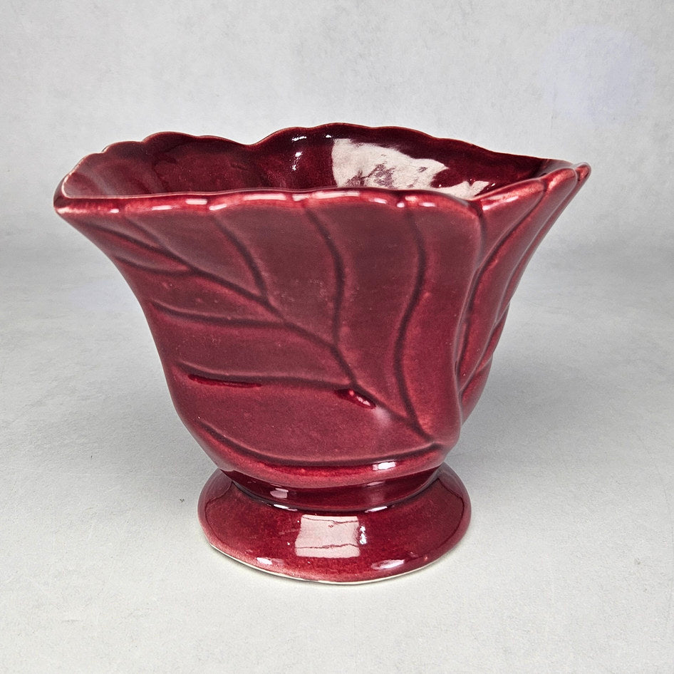 Burgundy leaf relief ceramic pedestal vase attributed to Drostdy Ware