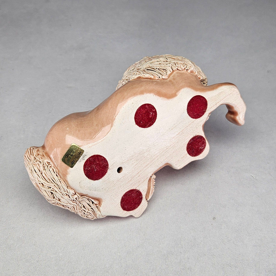 Pink Cheval Ceramics reclining pony with cream textured mane