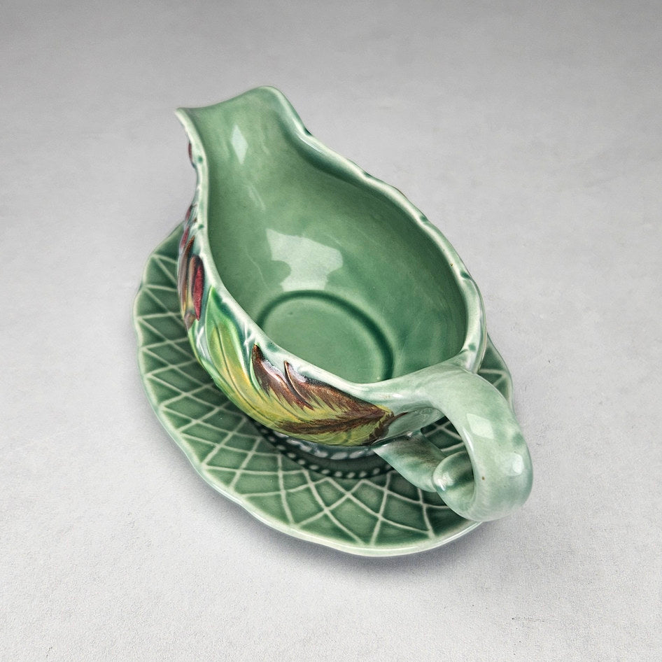 Clarice Cliff Newport leaf and berry sauce boat with stand, photograph 4 of this collectible ceramic piece