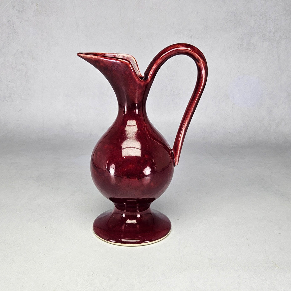 Drostdy Ware burgundy pedestal ewer with sweeping pointed lip