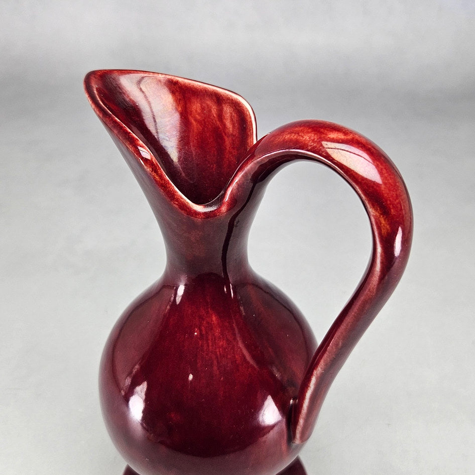 Drostdy Ware burgundy ewer viewed towards neck and opening