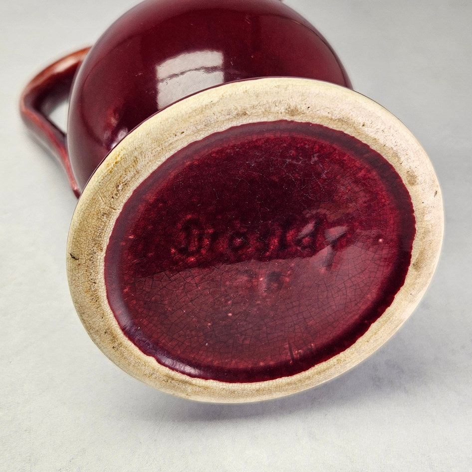 Drostdy Ware burgundy ewer underside showing impressed maker marking