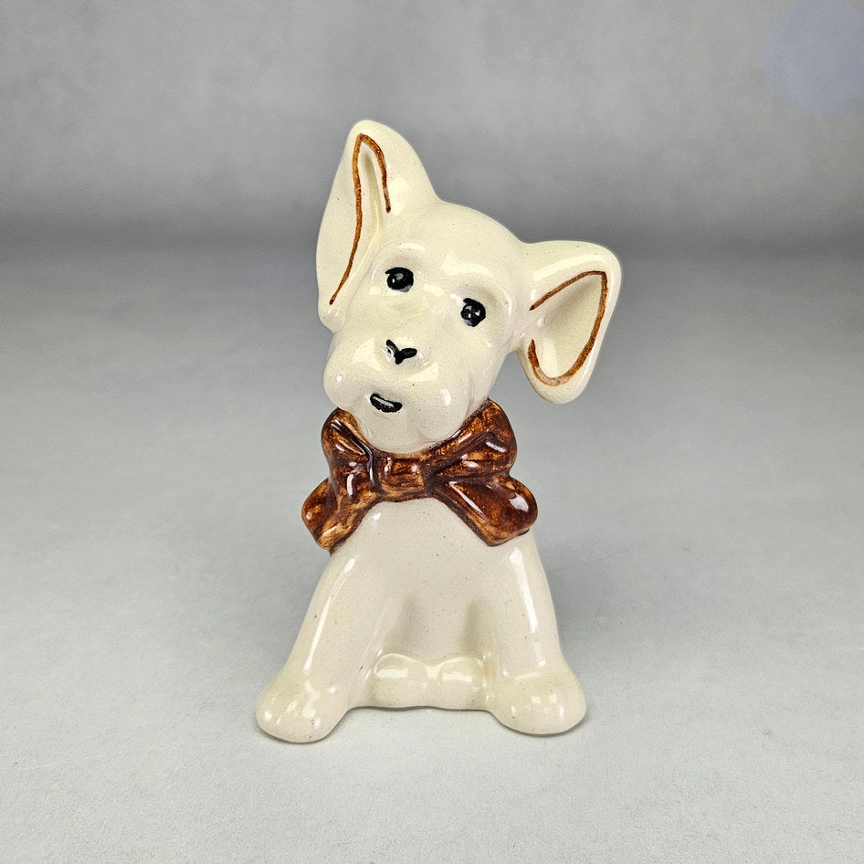 Drostdy Ware Cream Dog with Brown Bow