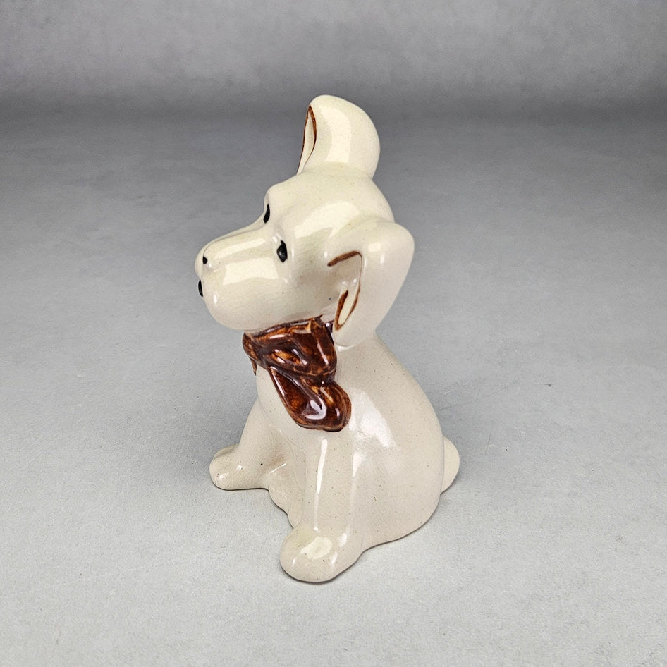 Drostdy Ware Cream Dog with Brown Bow