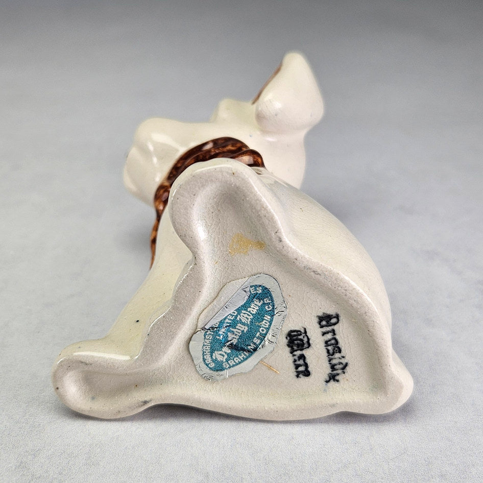 Drostdy Ware Cream Dog with Brown Bow