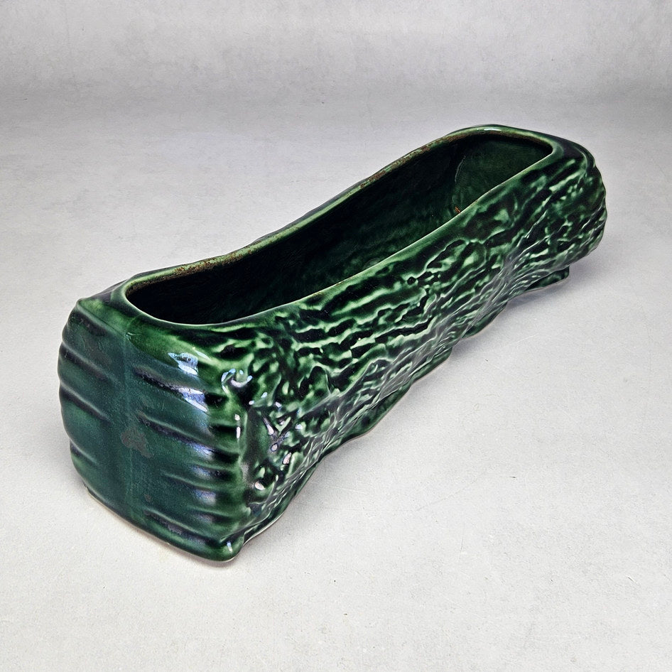 Drostdy Ware green log planter showing textured side profile