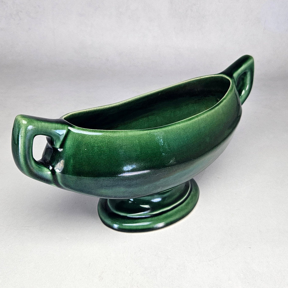 Drostdy Ware green pedestal planter showing elongated boat-shaped bowl
