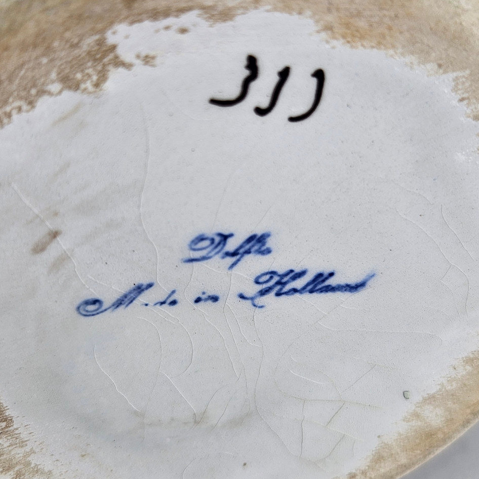 Dutch floral vase base close-up showing Delfts and Holland markings