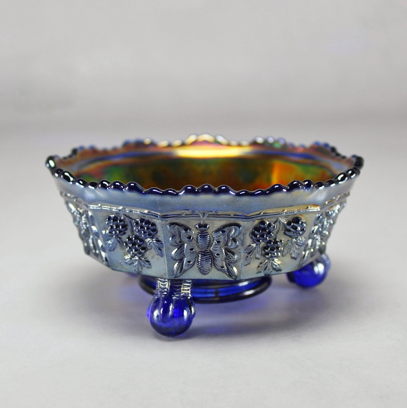Fenton Carnival Glass Butterfly and Berry Claw Footed Bowl