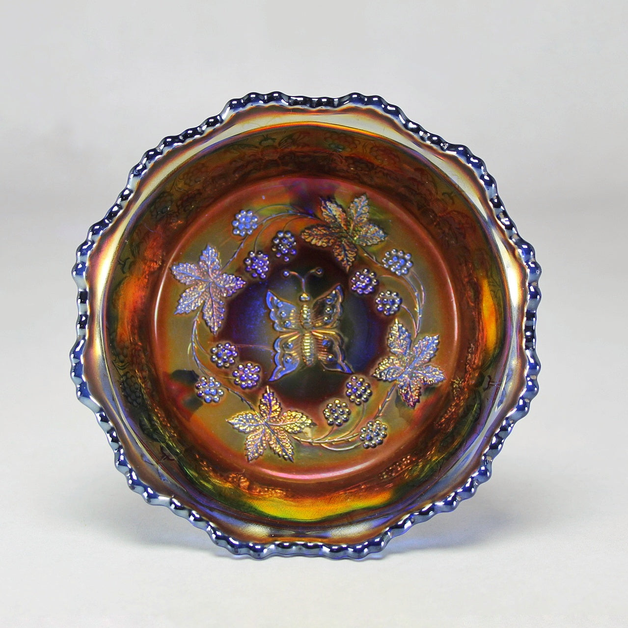 Fenton Carnival Glass Butterfly and Berry Claw Footed Bowl