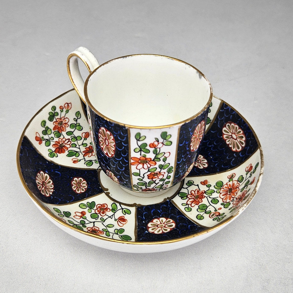 Worcester cup and saucer showing gilt rim and floral decoration
