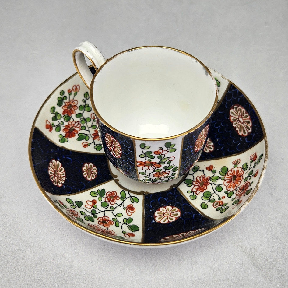 Overhead view of Worcester cup and decorated blue scale saucer
