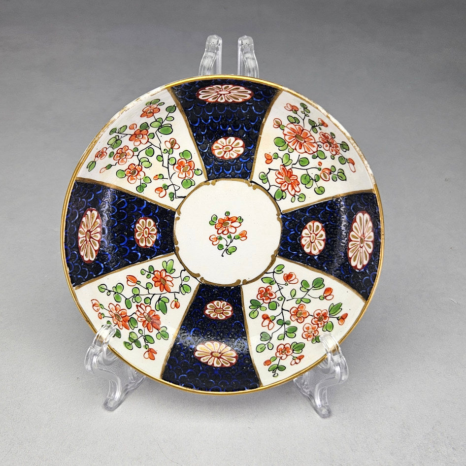 Worcester saucer with floral reserves and cobalt scale decoration