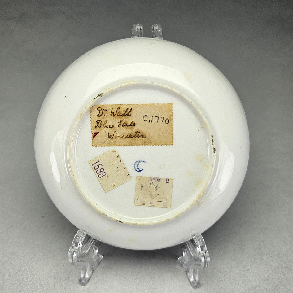 Underside of Worcester saucer with crescent mark and collector labels