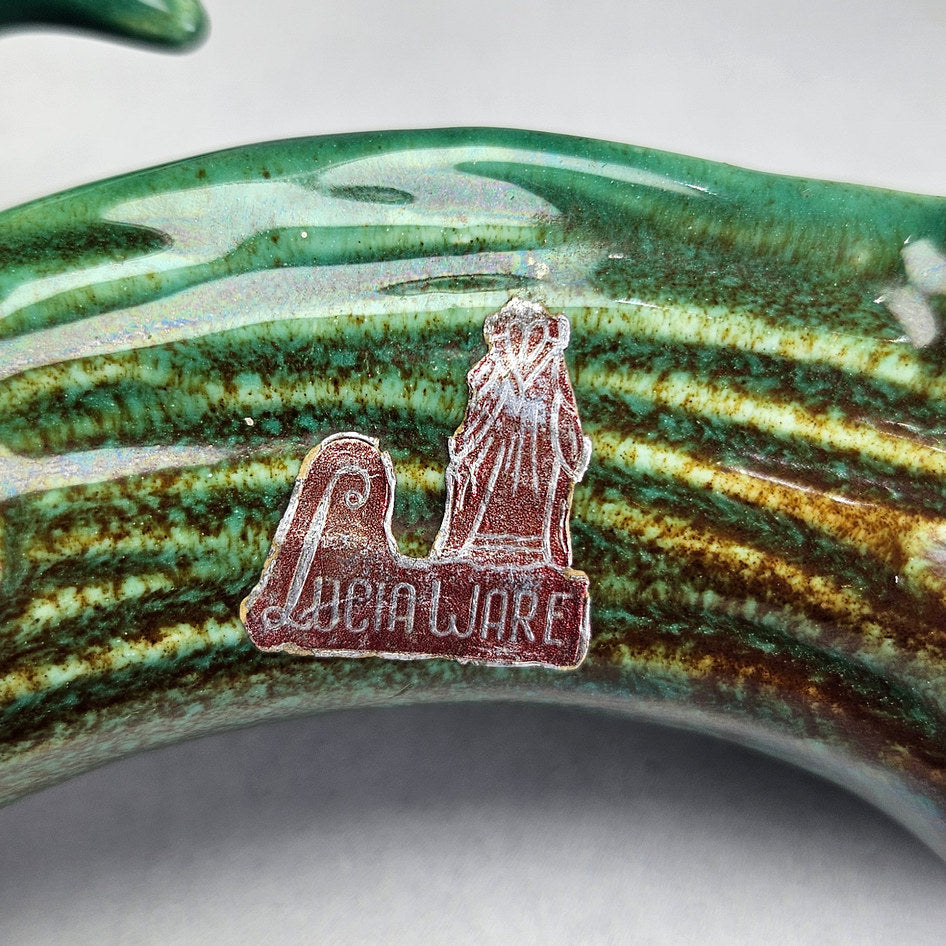 Lucia Ware bird log planter showing retained maker label