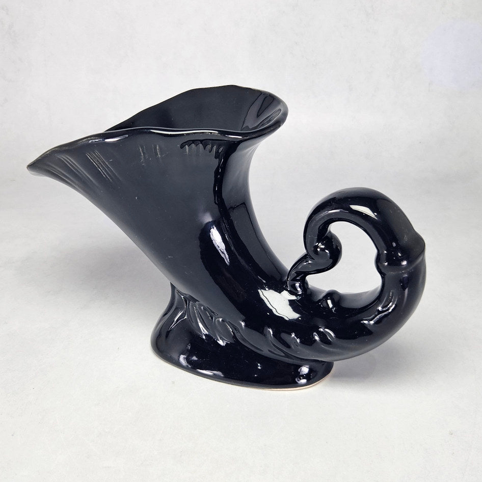 Lucia Ware black ceramic cornucopia vase with curled scroll end