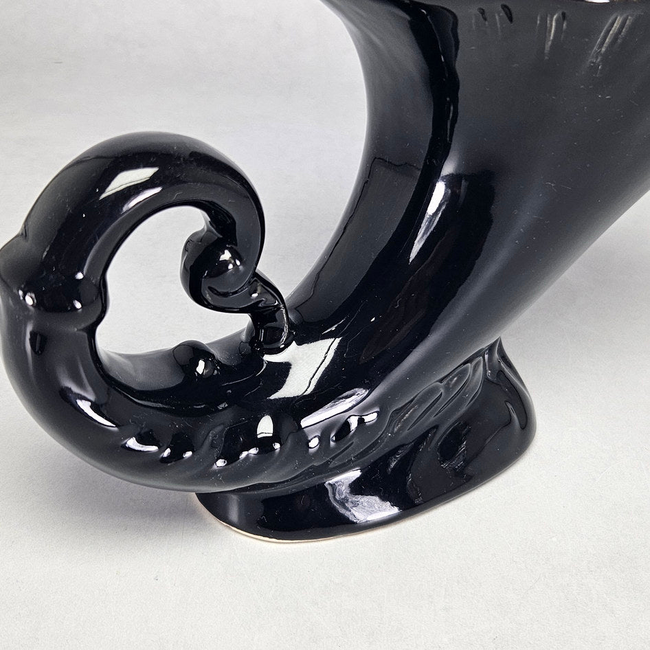 Lucia Ware black ceramic cornucopia vase with curled scroll end