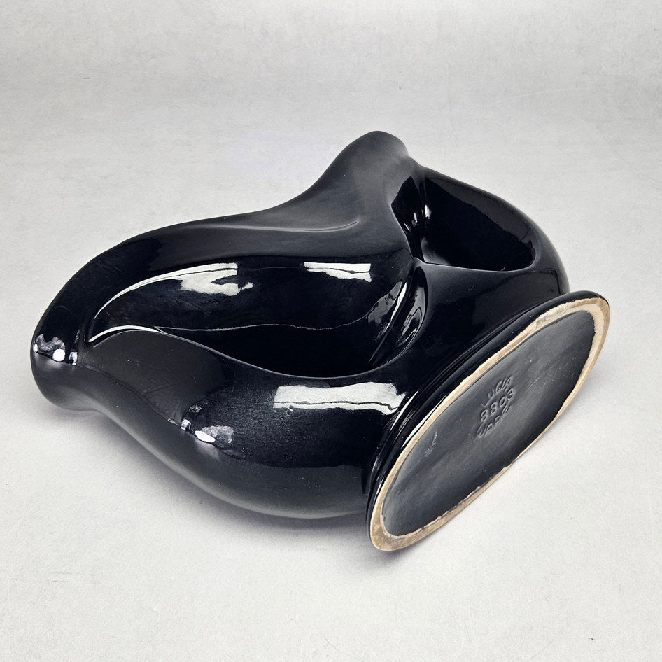 Lucia Ware black ceramic mantel vase with pierced teardrop openings