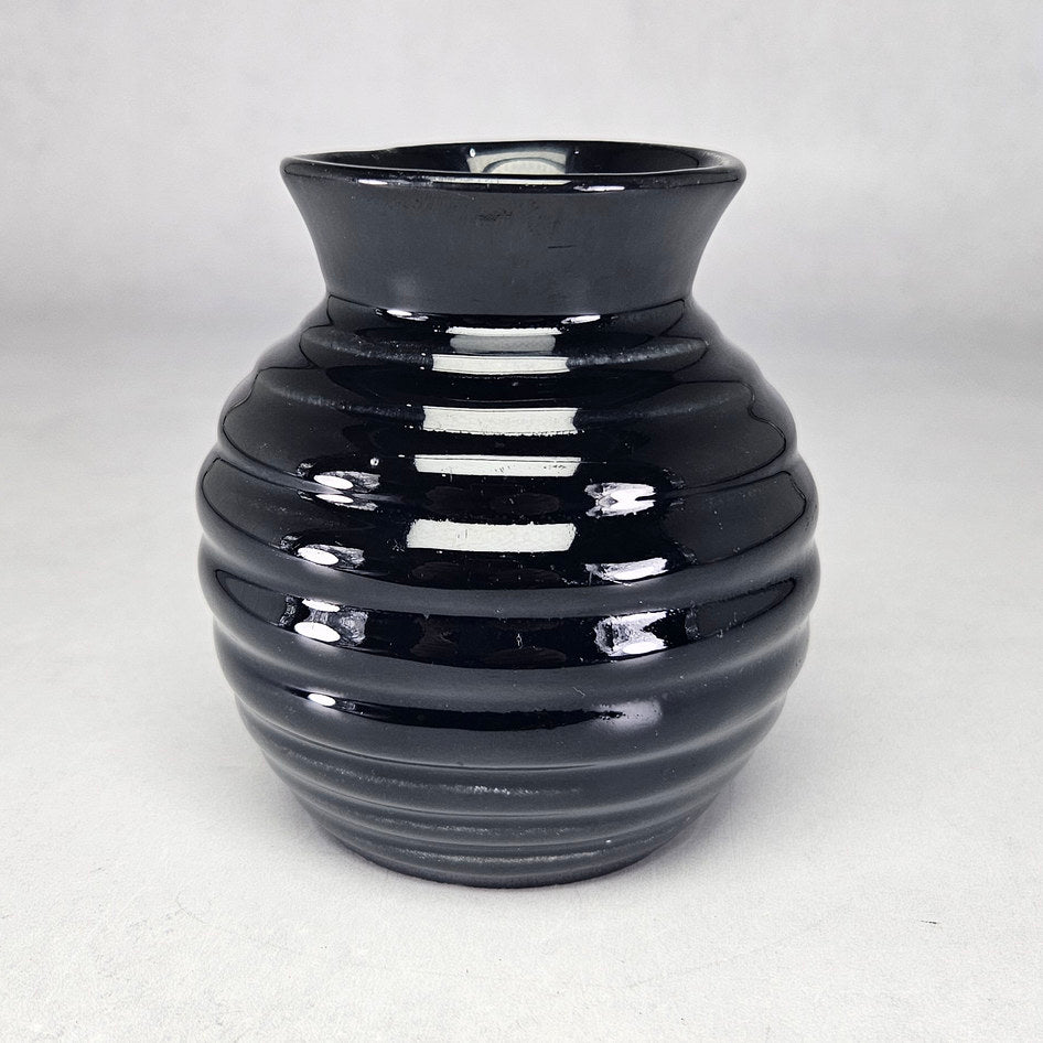 Lucia Ware glossy black ribbed ceramic beehive vase model 2011