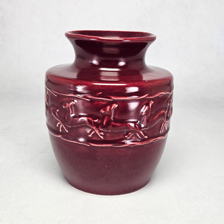Lucia Ware burgundy ceramic vase with running antelope relief 4412
