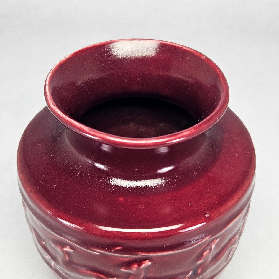 Lucia Ware burgundy ceramic vase with running antelope relief 4412