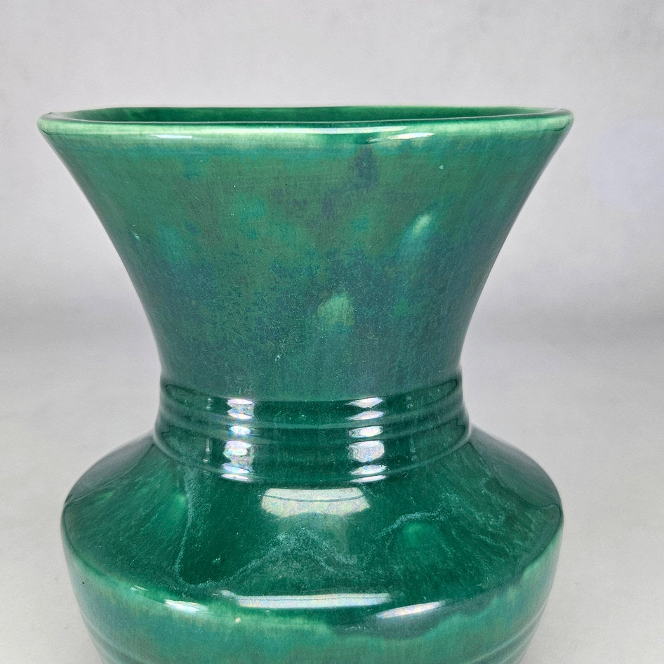 Lucia Ware green flared vase showing narrow banded waist