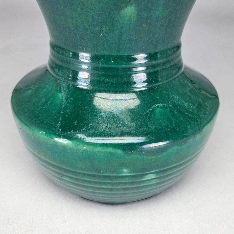 Lucia Ware green flared vase showing rounded lower body