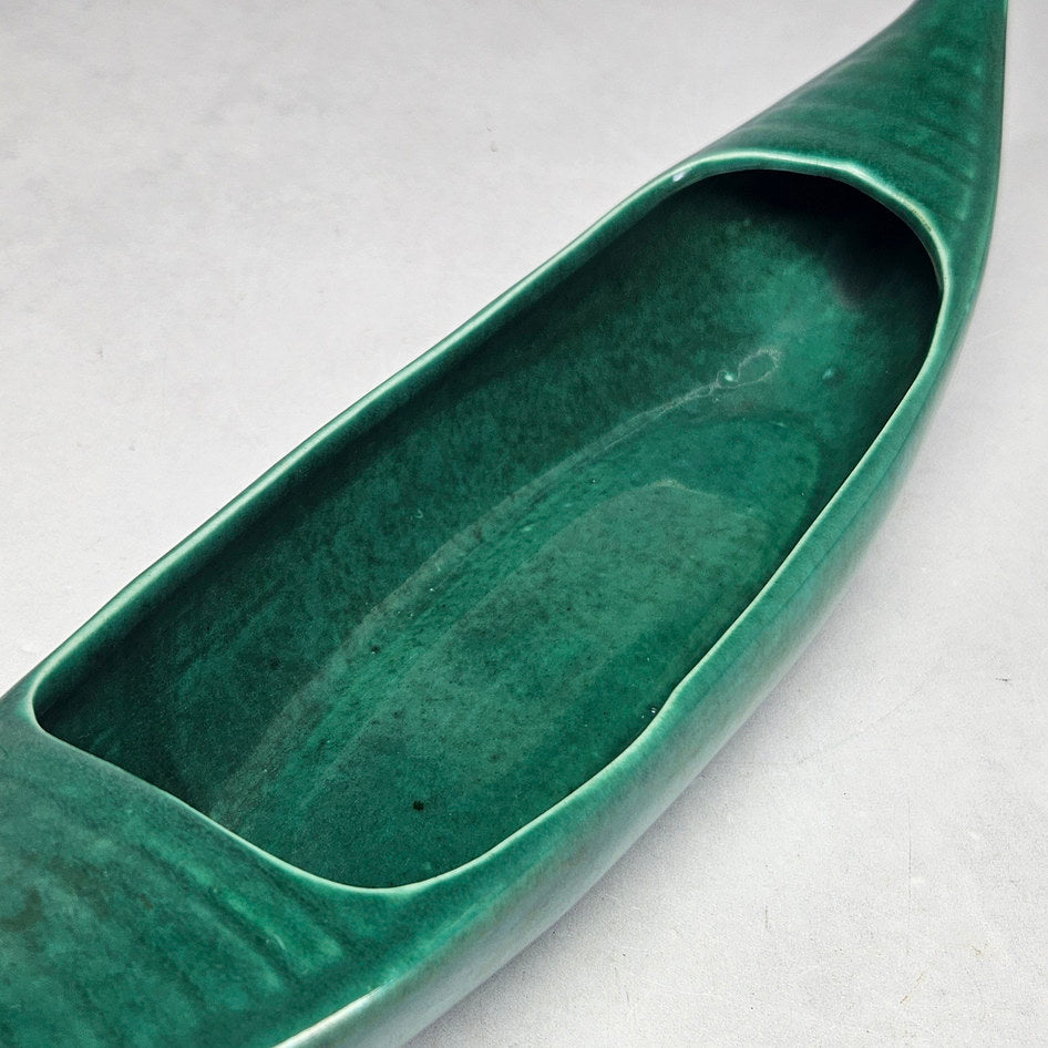 Lucia Ware green gondola planter interior showing variegated glaze