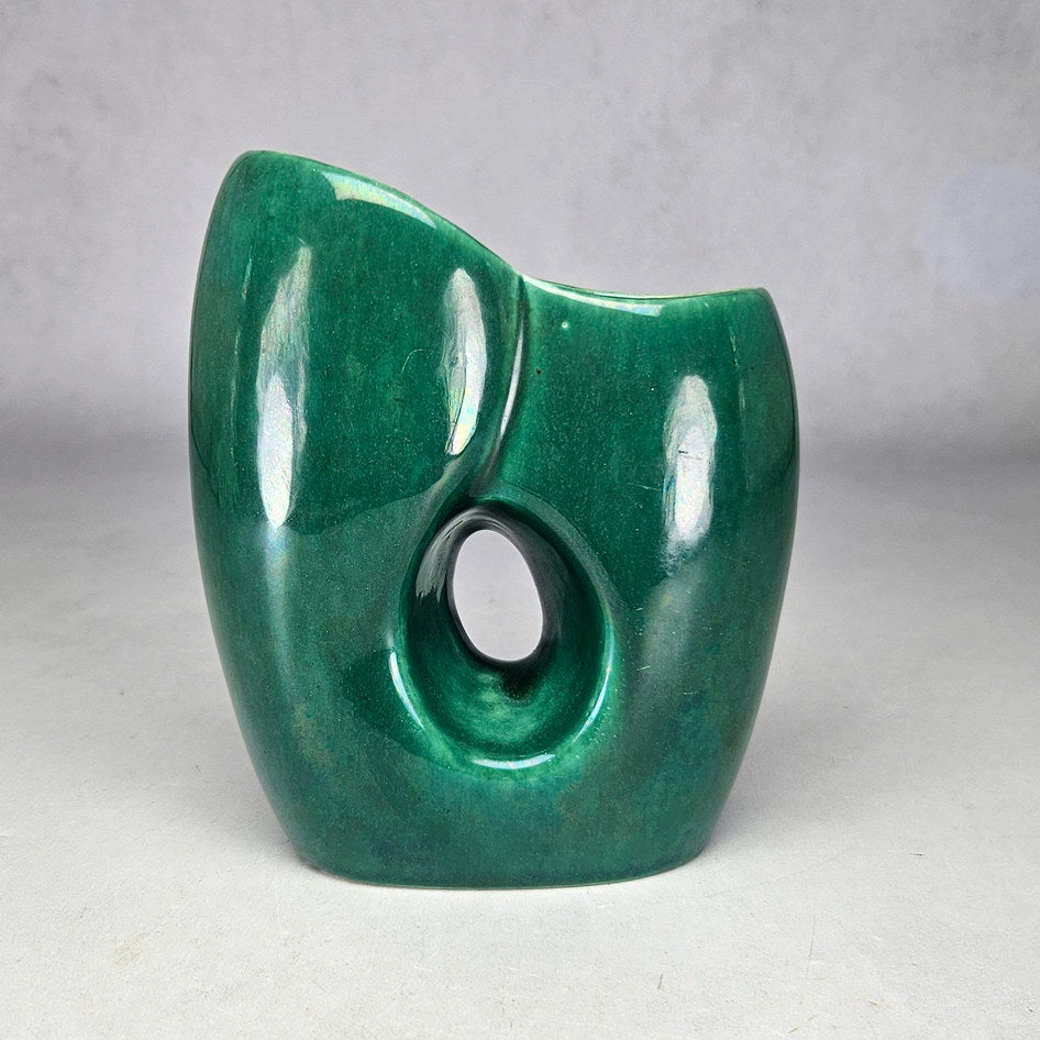 Lucia Ware green asymmetric vase with pierced teardrop opening