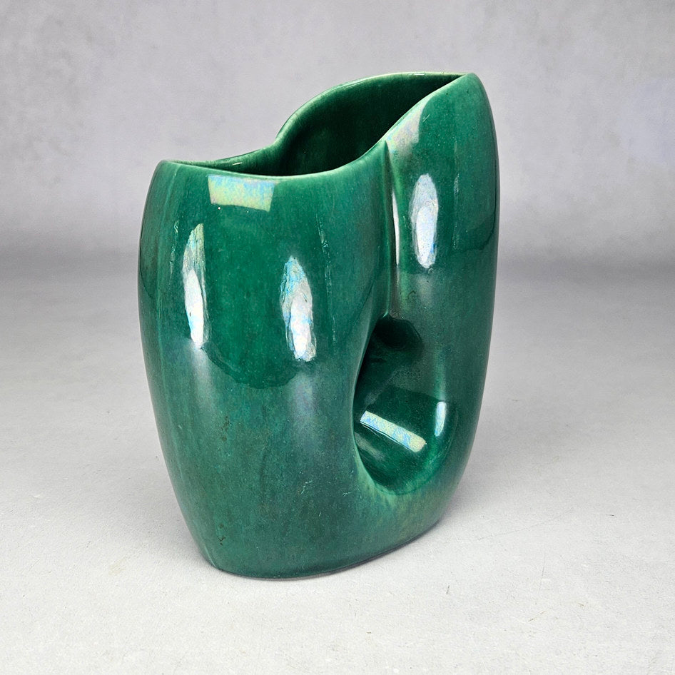 Lucia Ware green asymmetric vase showing raised curved rim