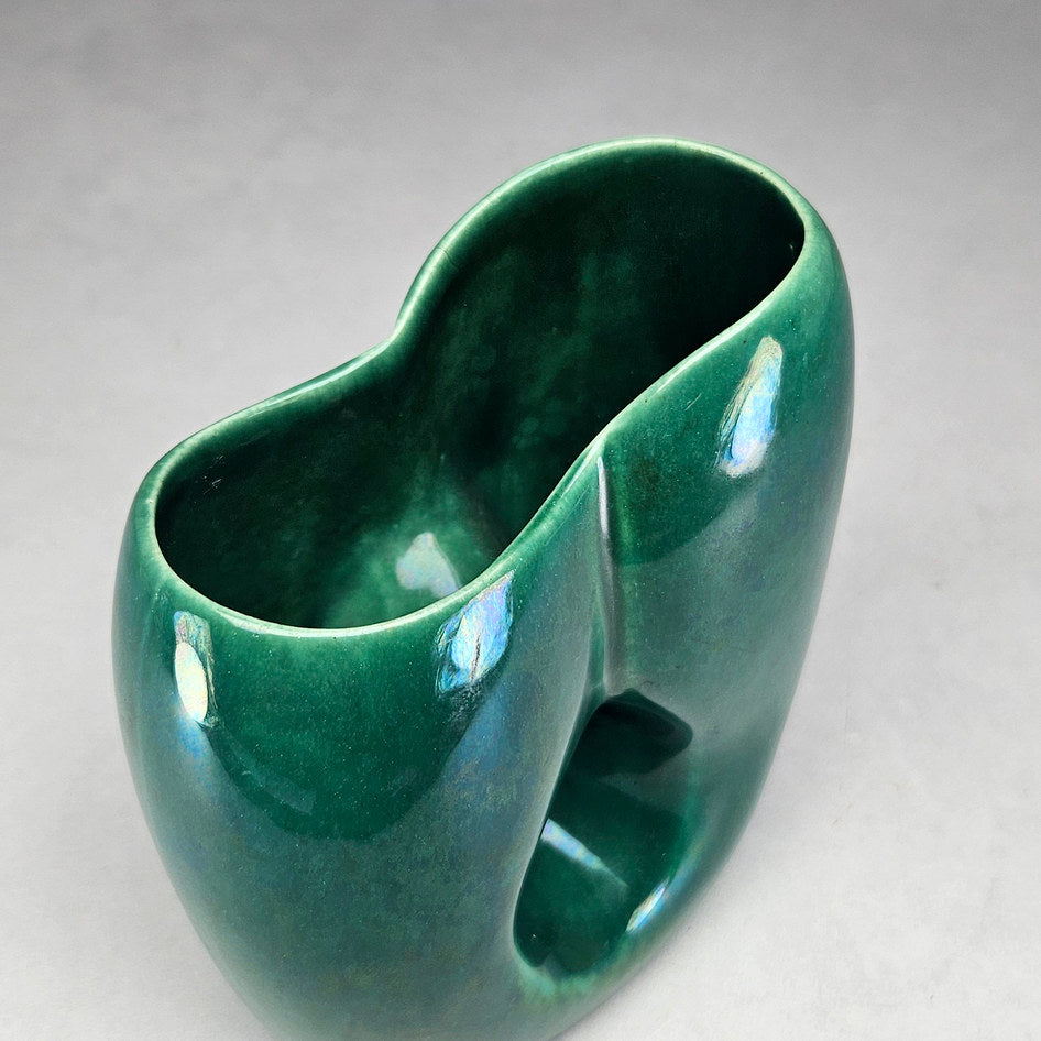 Lucia Ware green asymmetric vase viewed towards elongated opening