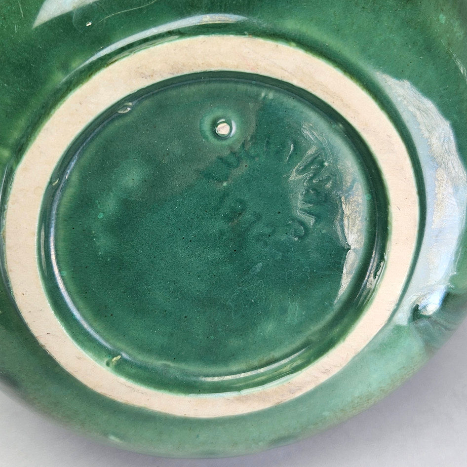 Lucia Ware green scroll jug underside showing faint impression