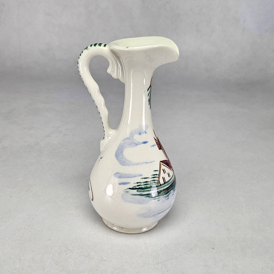 Lucia Ware cream ceramic ewer with hand-painted windmill landscape