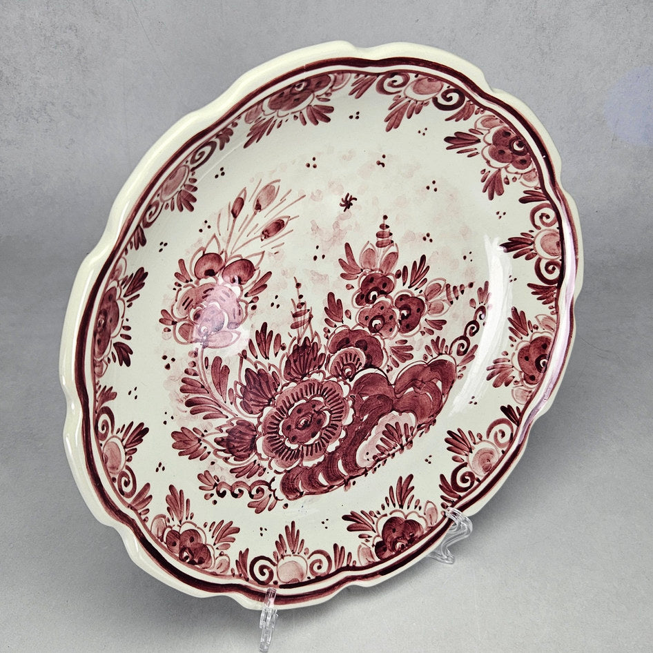 Angled view of M. de Wit burgundy floral wall plate