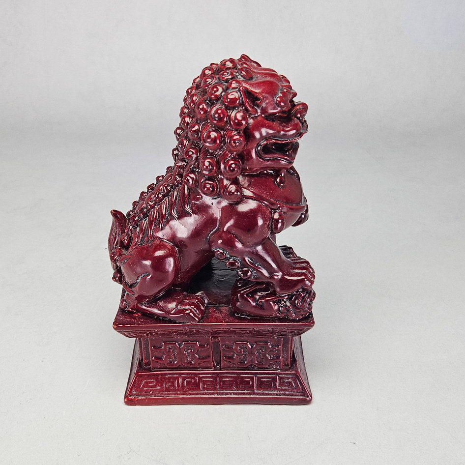 Pair of Chinese Red Cinnabar-Style Resin Foo Dog Figurines