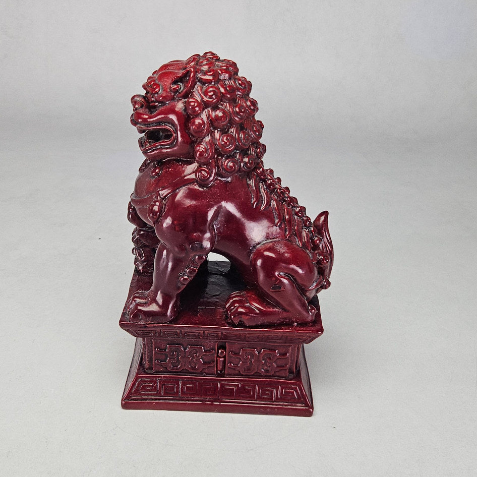 Pair of Chinese Red Cinnabar-Style Resin Foo Dog Figurines