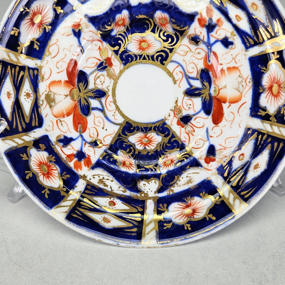 Royal Crown Derby 2451 coffee saucer showing its shaped ceramic form