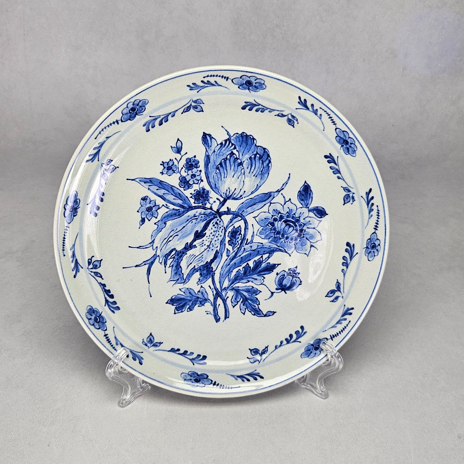 Royal Delft blue and white wall plate with floral bouquet