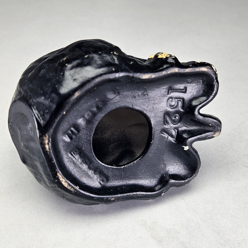 Black seated English ceramic elephant attributed to Sylvac, photograph 5 of this collectible ceramic piece