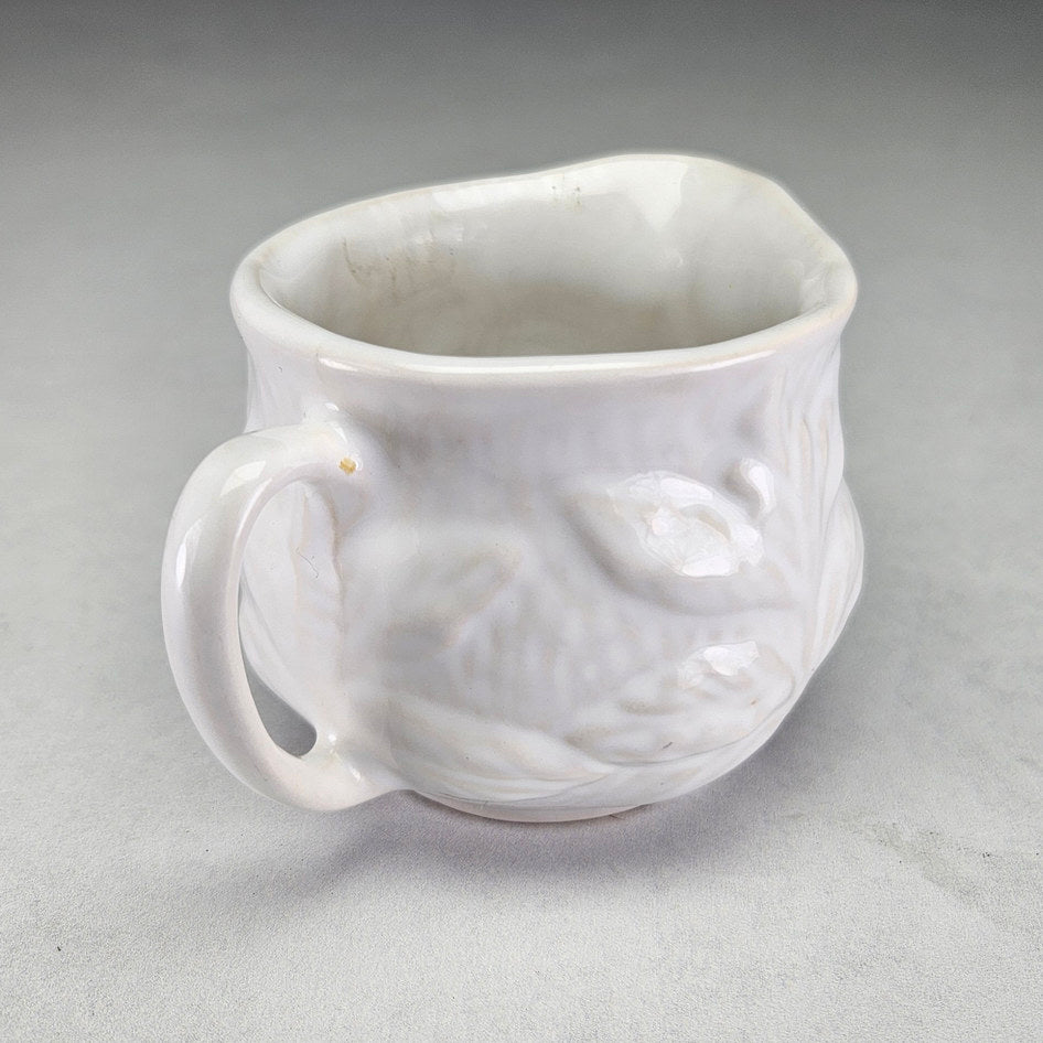 White Sylvac 4683 leaf moulded mint sauce jug, photograph 2 of this collectible ceramic piece