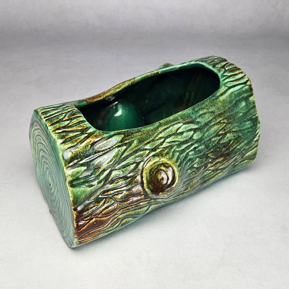 Vermont green log planter showing rounded end and label