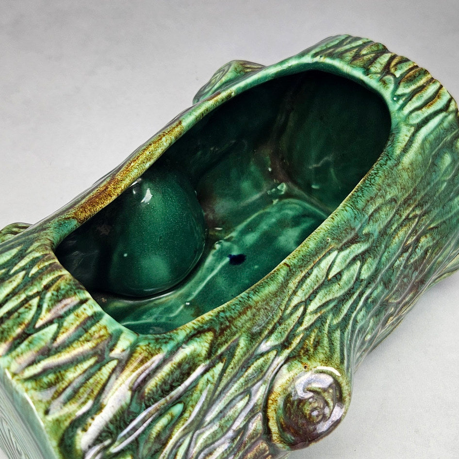Vermont green log planter interior showing elongated planting opening