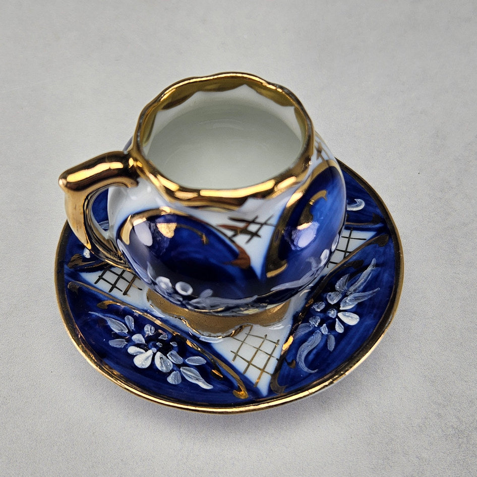 Side view of gilt handled Portuguese cobalt cup